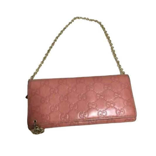 Gucci, salmon colored embossed Guccissima print leather, XL size, wallet on a removable chain