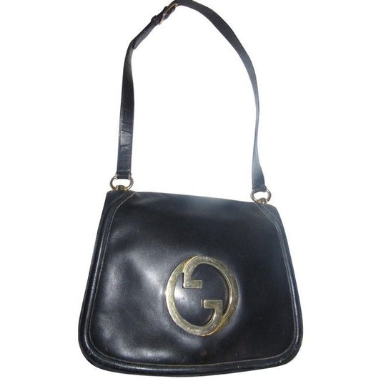 Vintage Gucci midnight blue leather 'Blondie' saddle style, shoulder bag with large, gold 'GG' emblem & multiple compartments