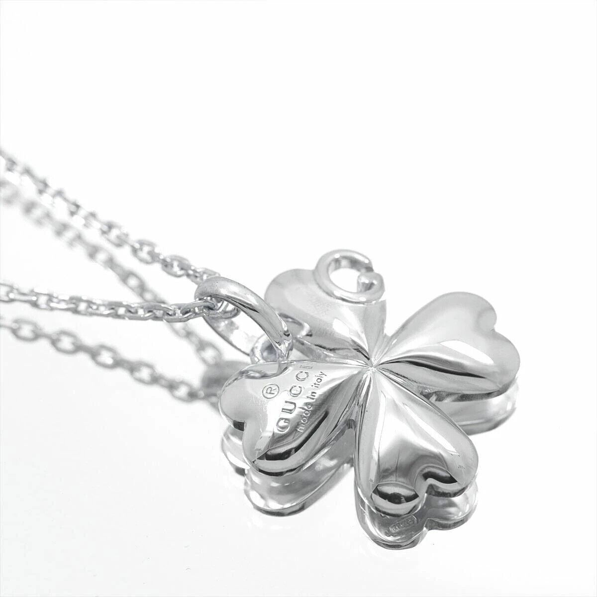 Gucci sterling silver four leaf clover pendant with G logo cut-out on an 18" chain