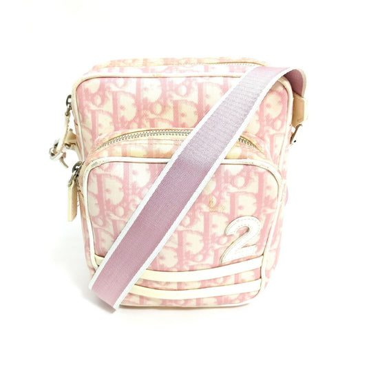Christian Dior, pink and white trotter print canvas and white patent leather cross body with a structured, rectangular shape