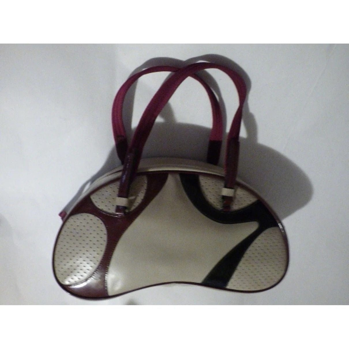 Vintage, 1990s Prada, light taupe leather and burgundy and black patent leather, satchel/ bowling bag style purse in a kidney shape