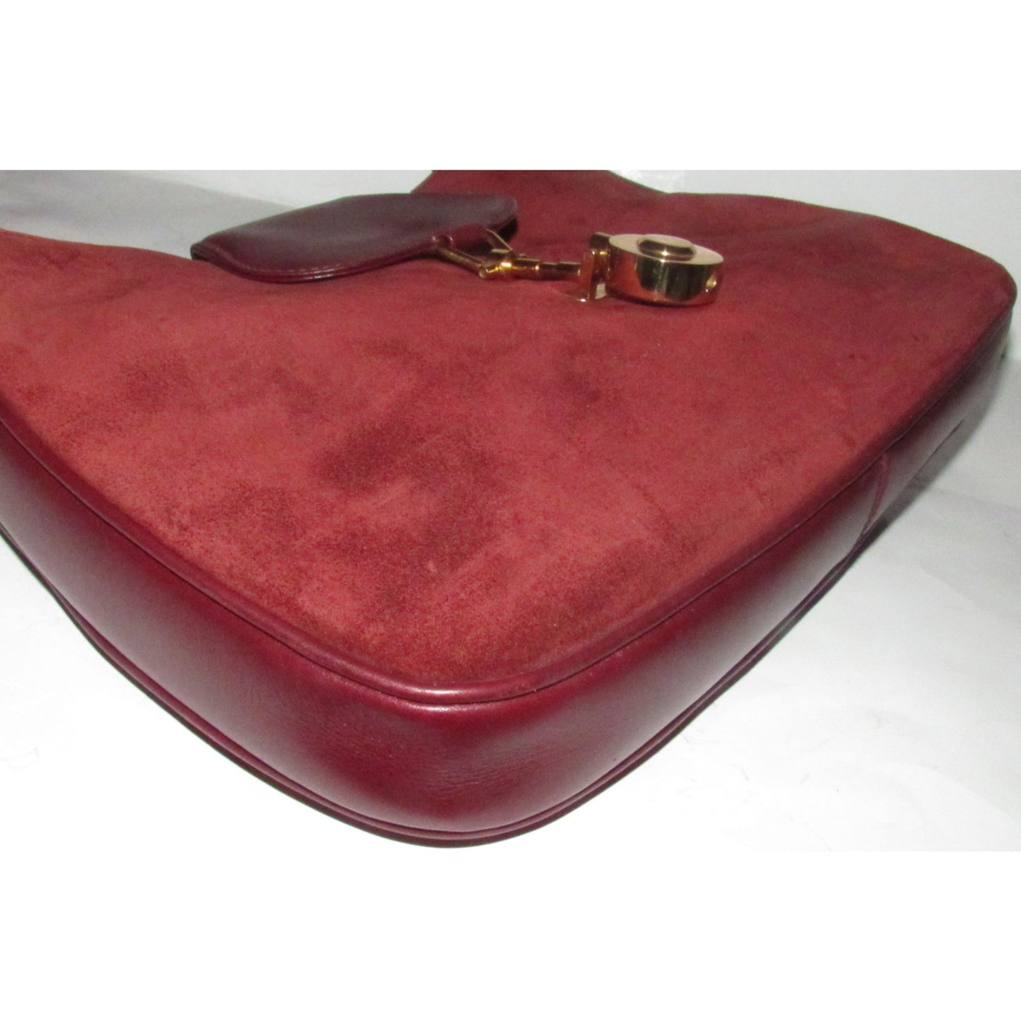 Rare, vintage, Gucci, burgundy leather & suede, unique, 1961 Jackie, hobo style shoulder bag with a two-tone piston closure & flap top