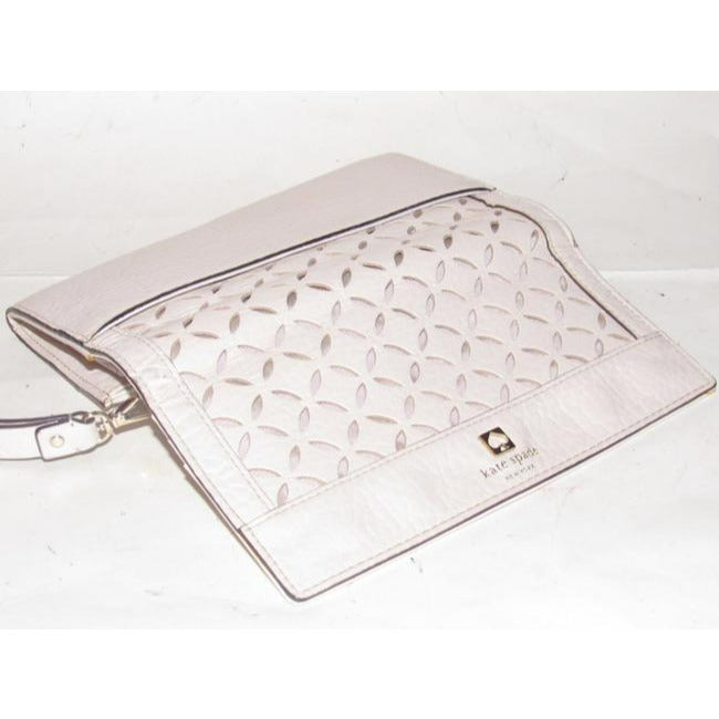 SALE! Kate Spade Pale Pink Leather With A Cut Out Design And Wrist Strap Wallet